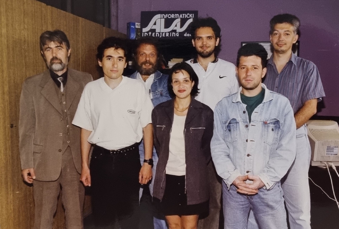 An old photo of the team of developers who founded Alas company.
